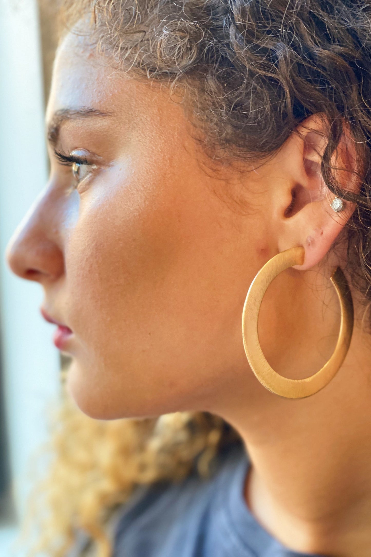 Alma Thick Flattened Metal Hoop Earrings in Gold 2.25 Inch