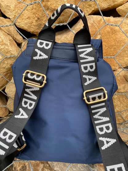 Belted Blue Backpack with Adjustable Straps and Gold Accents