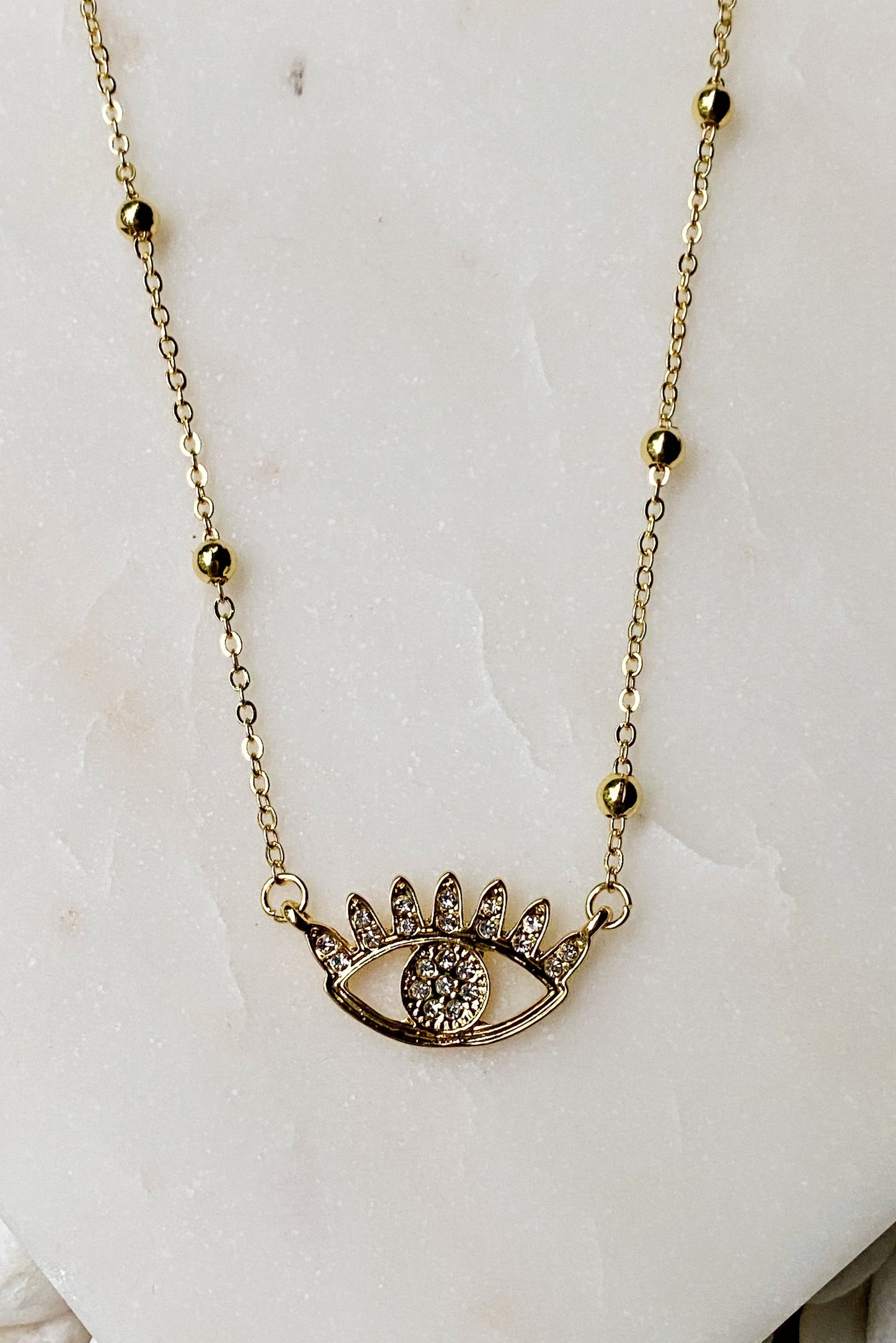 Bright & Studded Eye Necklace with Rhinestone Detail