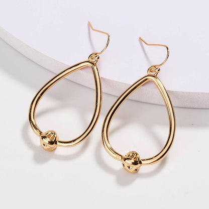 Dainty Love Knot Earrings in 18k Gold or Silver Finish