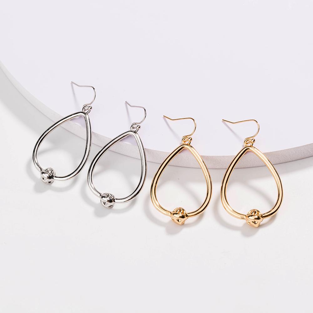 Dainty Love Knot Earrings in 18k Gold or Silver Finish