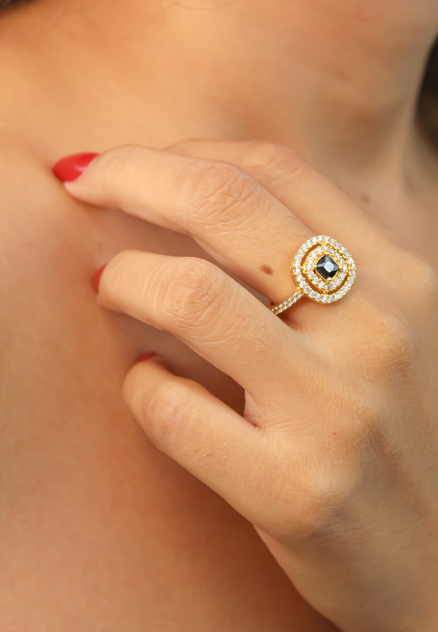 Elegant Golden Maldives Ring with Zirconia Stones