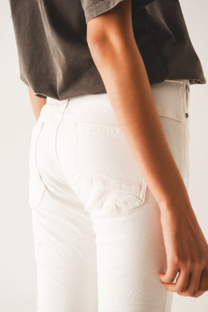 Exposed Buttons Skinny Jeans in Cream for Modern Style