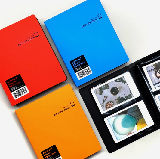 "meta_description": "Stylishly store Polaroids with the PINKFOOT Two-Color Polaroid Album. Features 80 pocket storage.",