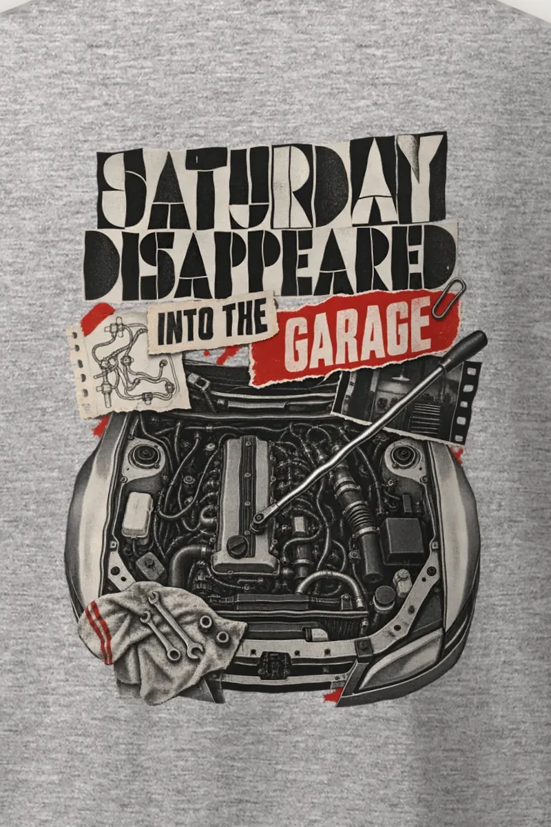 "Saturday Disappeared Into the Garage" Heavyweight Unisex Crewneck T-shirt - the graphic up close