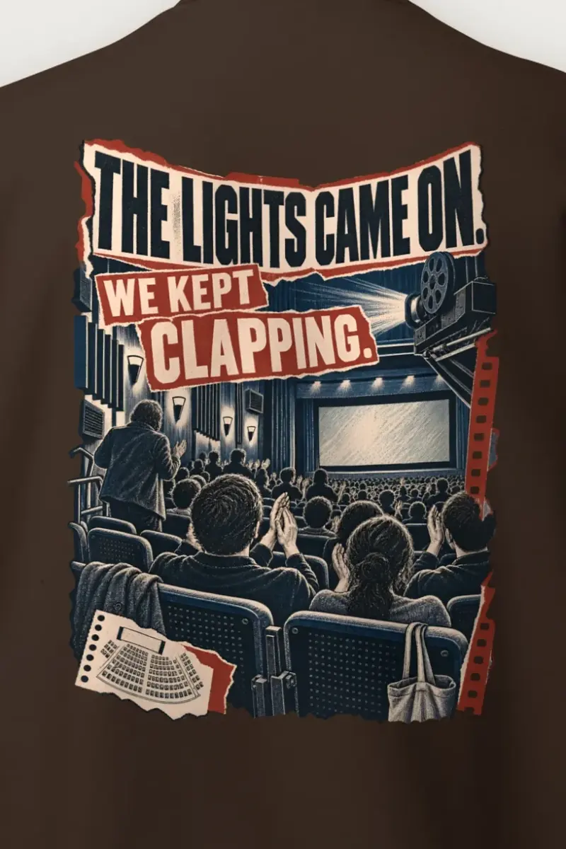 "We Kept Clapping" Heavy Blend Unisex Crewneck Sweatshirt - the graphic up close